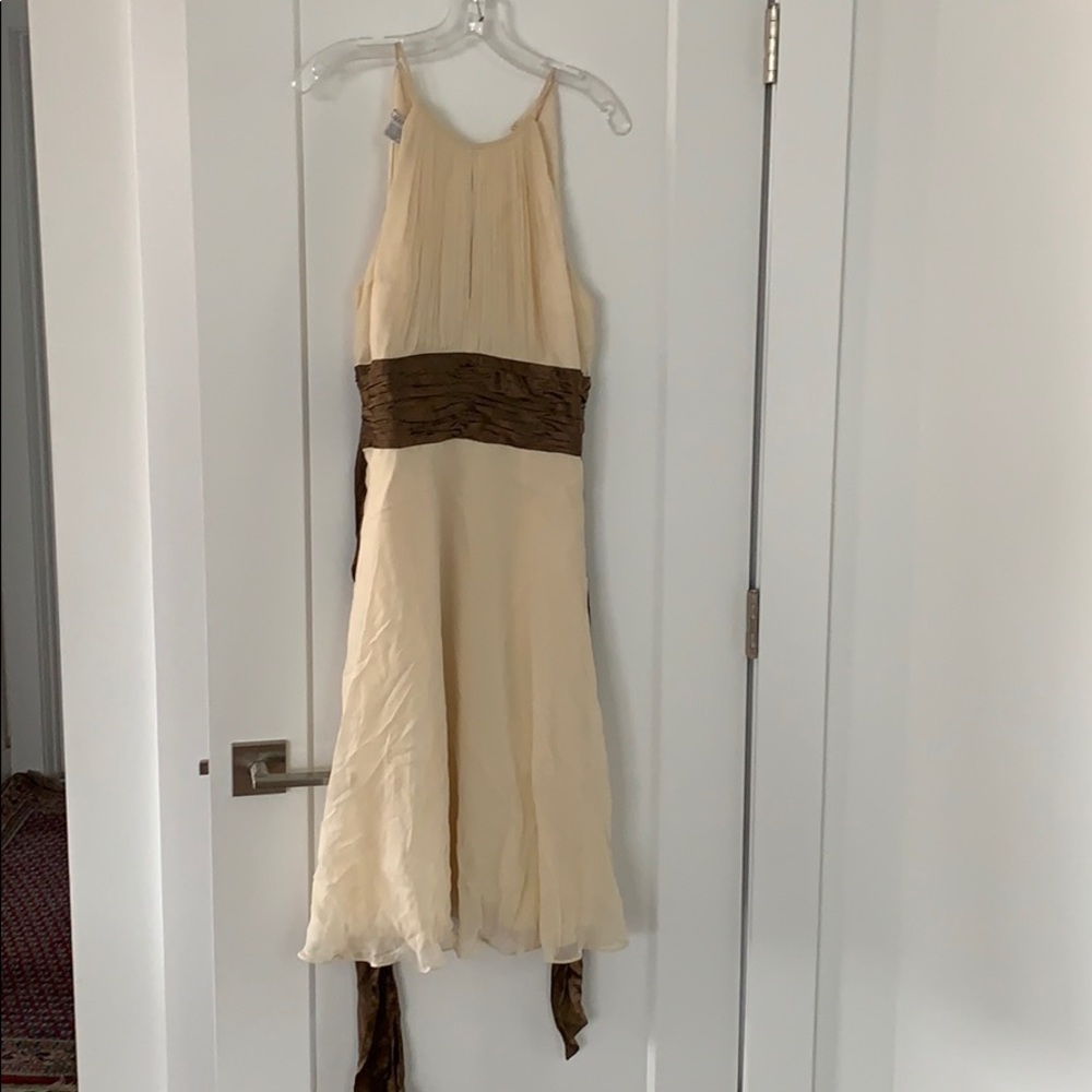 Beige dress with brown sash